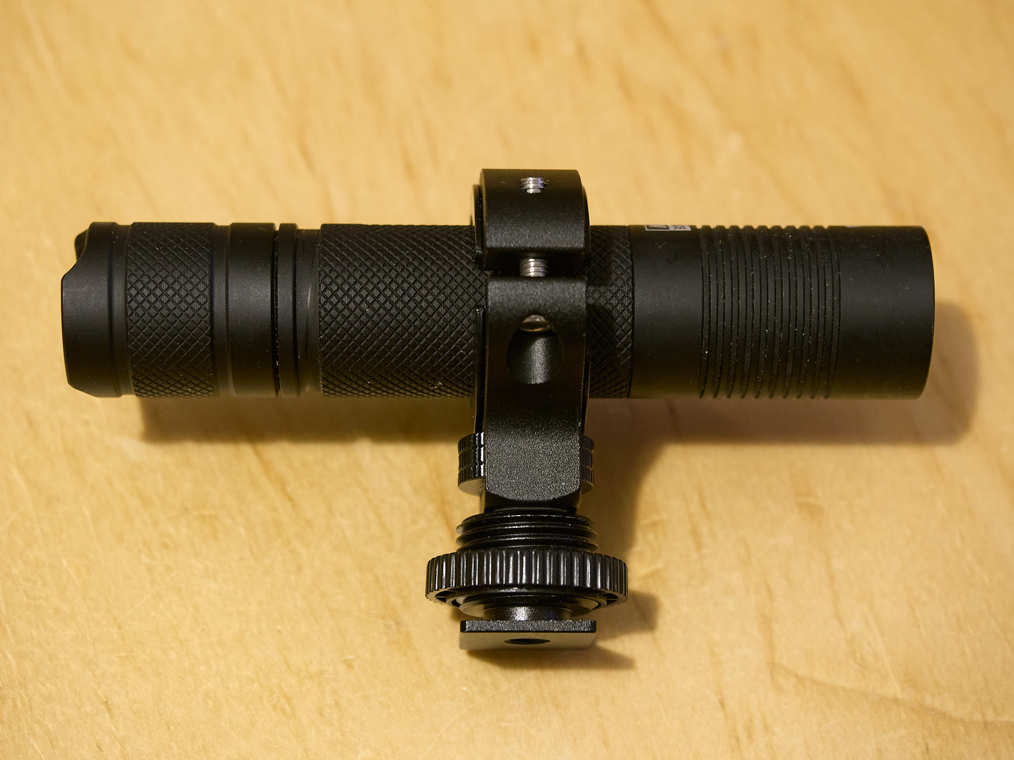 B: Jaxman Uc1 flashlight with a 6 W UV-A 365nm LED attached to anad-hocholder.